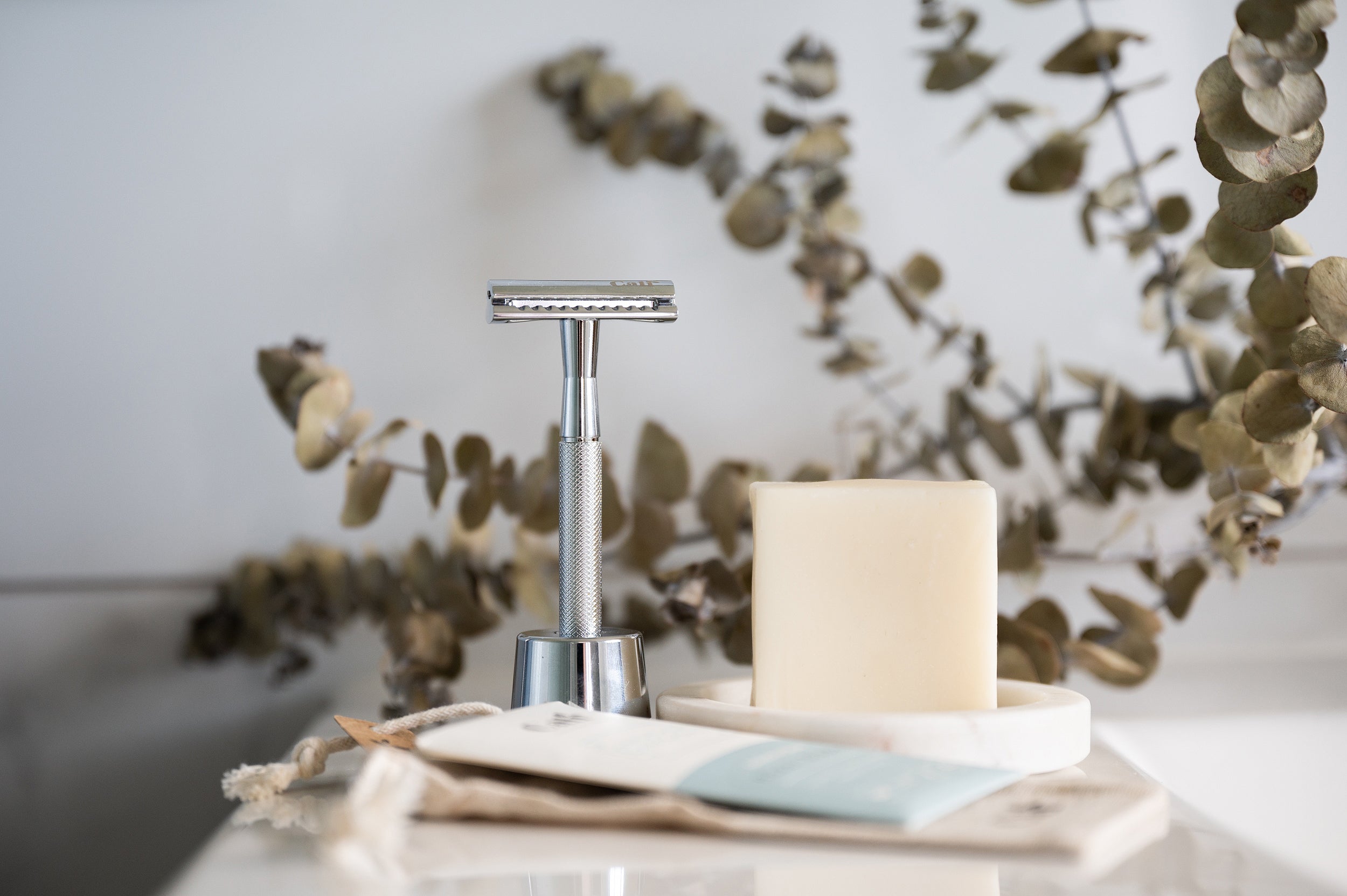 Silver Safety Razor in a stand with Shaving Soap Bar