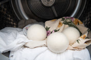 Three Dryer Balls from CaliWoods in a Dryer