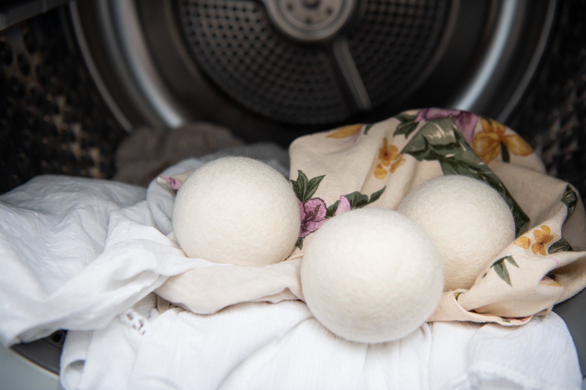 Three Dryer Balls from CaliWoods in a Dryer