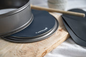 Close up of CaliWoods circular baking mats in a cake tin