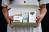 CaliWoods Safety Razor Shaving Kit in a Gift Box held in hands