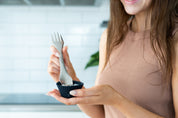 Stainless spork being dipped into a reusable Muffin Liner