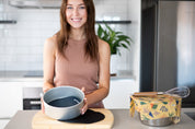 Circular Reusable Baking Mats in a tin