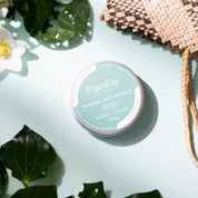 CaliWoods Sunscreen Natural Sunscreen SPF40 Non-toxic made in New Zealand NZ on blue background with Kawakawa and Calendula flower and flax Kite 