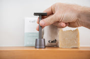 CaliWoods Safety Razor Shaving Kit for men in Slate Grey colour with hand holding the Safety Razor handle