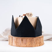 A black caliwoods reusbale party hat, part of the bold collection