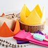 A yellow caliwoods reusable party hat - from the pastel variant pack